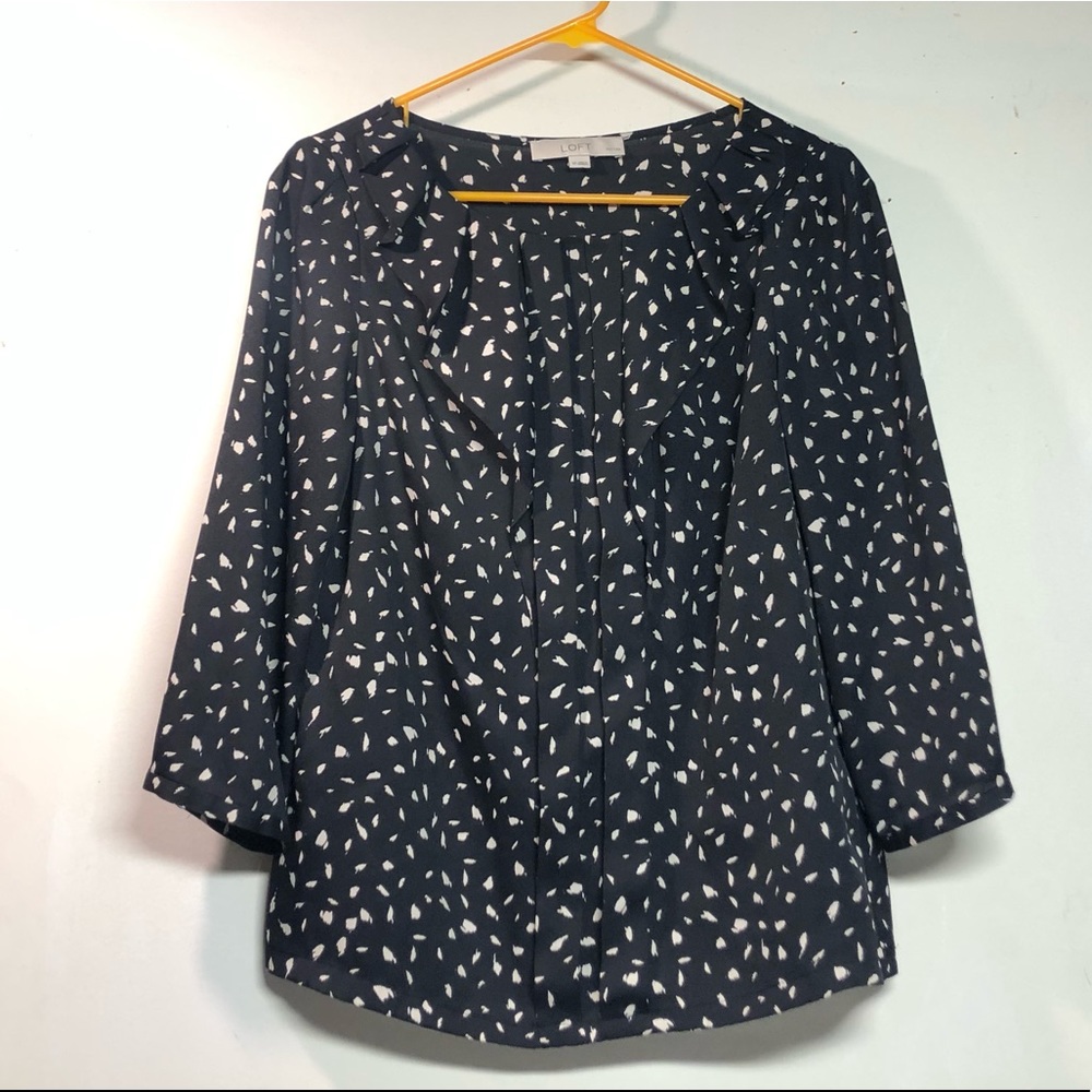 Black patterned ruffle blouse